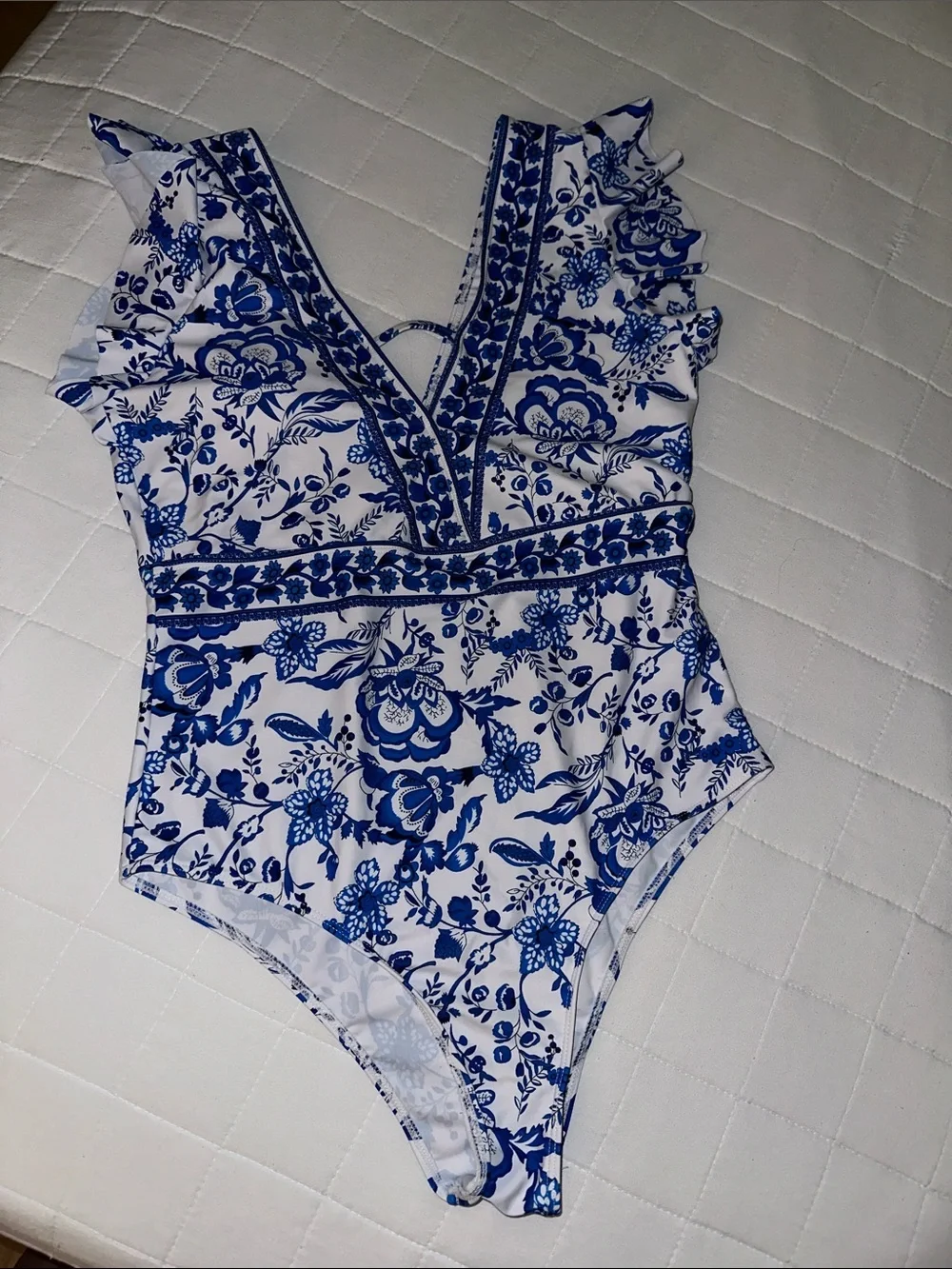Blue Floral One-Piece Swimsuit with V-Neck and Ruffle Shoulders